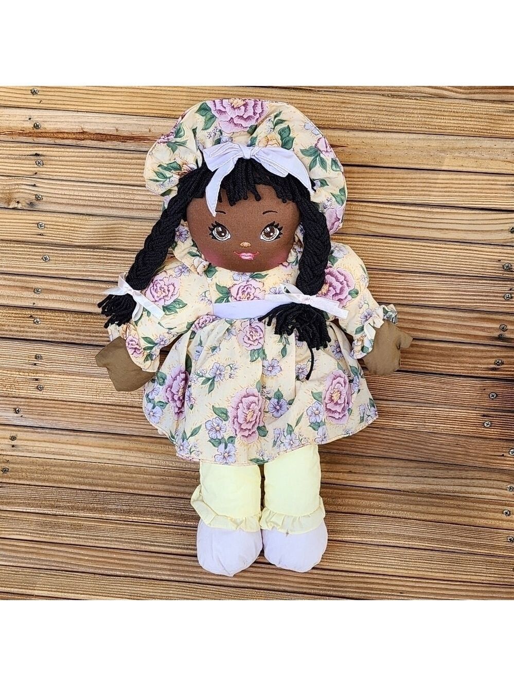 Vintage 1995 African American little girl plush doll floral dress